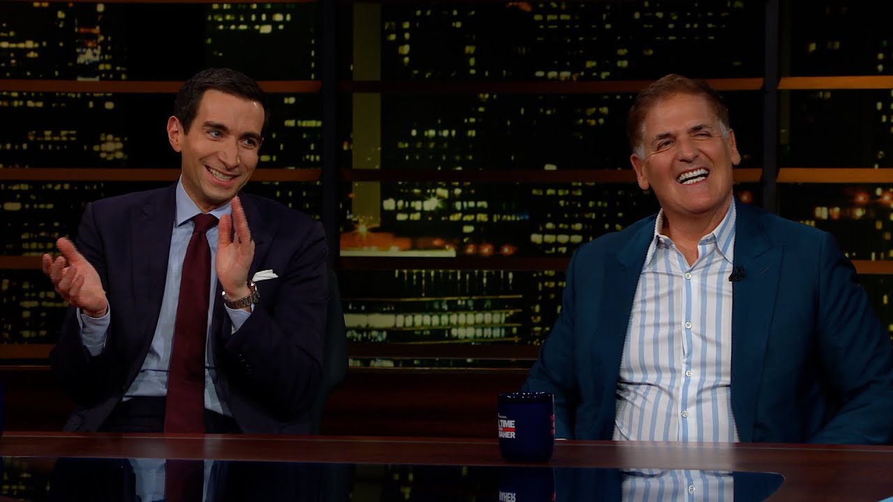 Mark Cuban speaking on stage during a high-profile interview