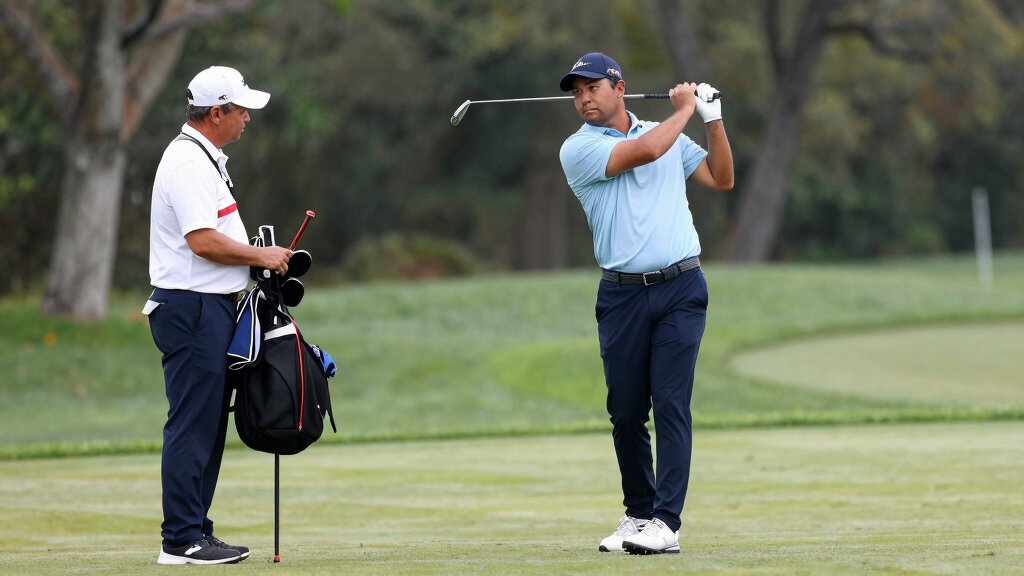 Tommy Fleetwood with caddie at championship