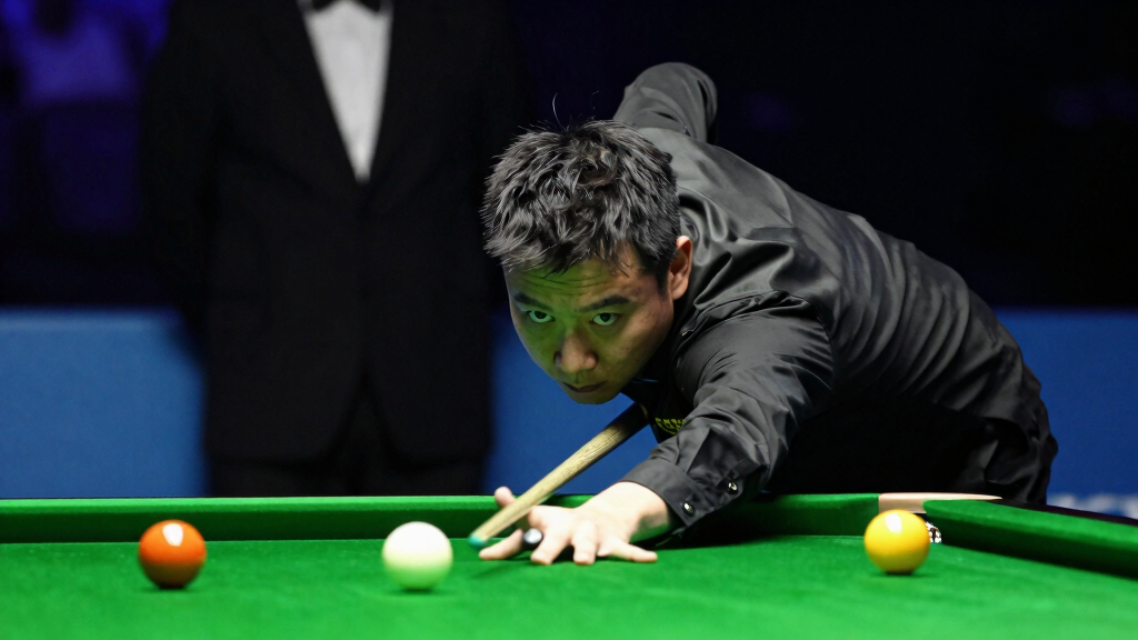 Hossein Vafaei concentrating at the snooker table during a major tournament