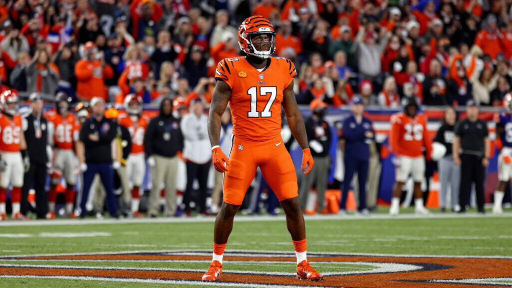 Joe Burrow celebrating a big play in Cincinnati Bengals orange