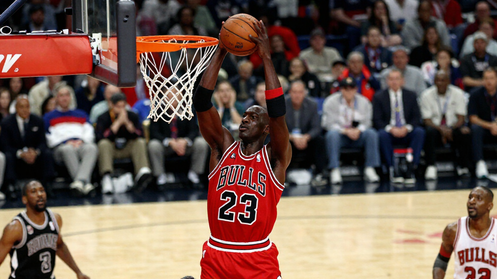 Michael Jordan dunking in Chicago Bulls jersey