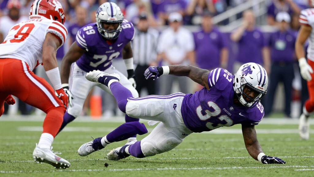 NFL running back in a purple Baltimore Ravens jersey breaking through defenders
