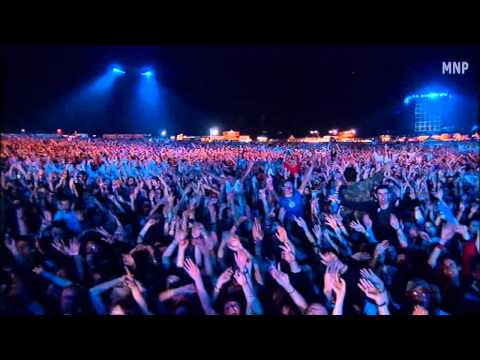 Robbie Williams performing live